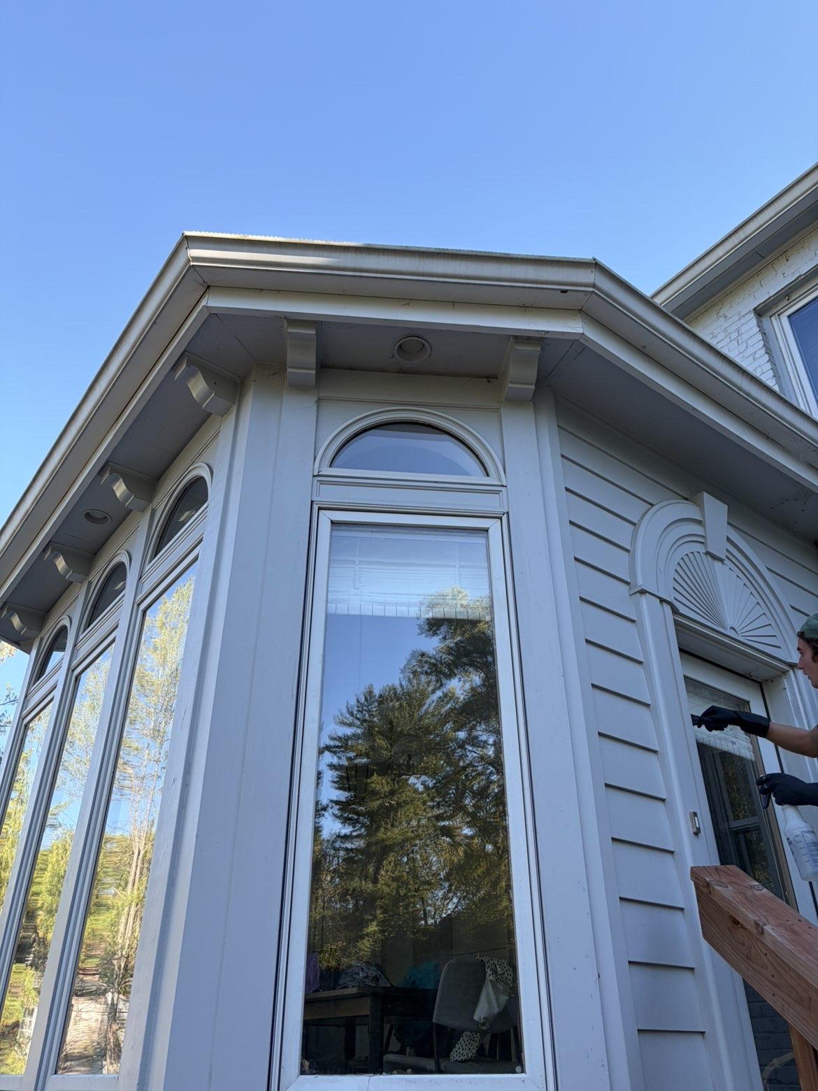 Clean bay windows on the exterior of a home